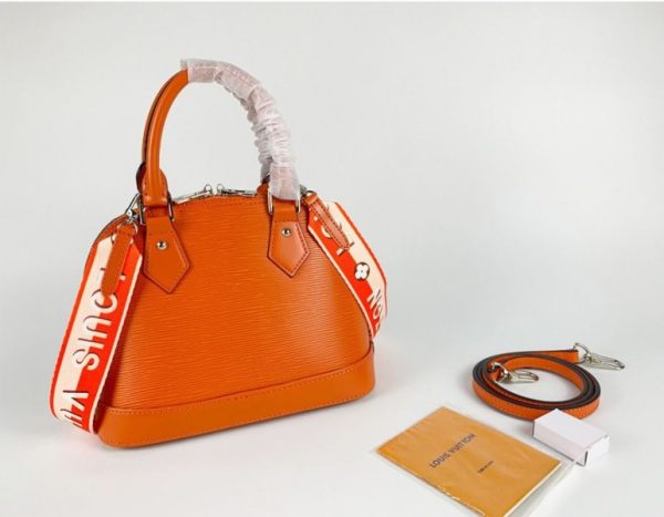 Replica Louis Vuitton Epi Leather Alma BB Handbag In Orange With Jacquard Strap - Image 4