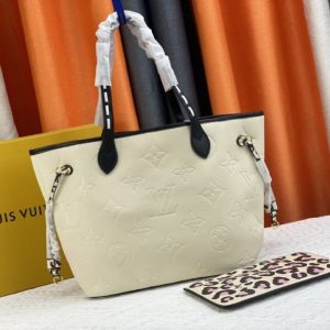 Replica Louis Vuitton Monogram Empreinte Wild At Heart Neverfull MM Tote In Cream