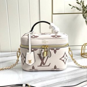 Replica Louis Vuitton Bicolor Monogram Empreinte Vanity PM Bag In Cream And Bois De Rose Pink