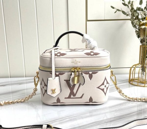 Replica Louis Vuitton Bicolor Monogram Empreinte Vanity PM Bag In Cream And Bois De Rose Pink