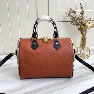 Replica Louis Vuitton Monogram Empreinte Wild At Heart Speedy 25 Bandouliere Handbag In Caramel Brown