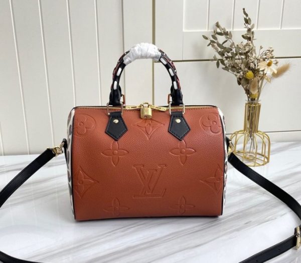 Replica Louis Vuitton Monogram Empreinte Wild At Heart Speedy 25 Bandouliere Handbag In Caramel Brown