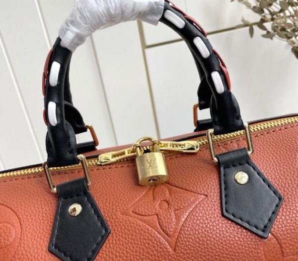 Replica Louis Vuitton Monogram Empreinte Wild At Heart Speedy 25 Bandouliere Handbag In Caramel Brown - Image 7