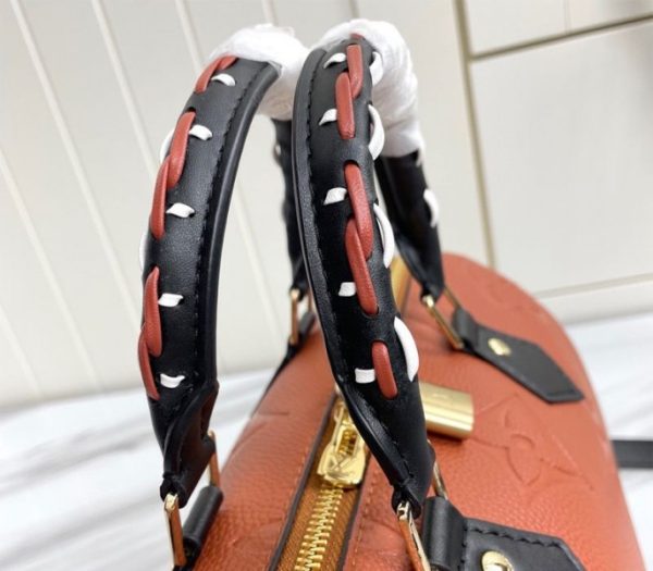 Replica Louis Vuitton Monogram Empreinte Wild At Heart Speedy 25 Bandouliere Handbag In Caramel Brown - Image 8