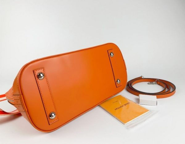 Replica Louis Vuitton Epi Leather Alma PM Handbag In Orange With Jacquard Strap - Image 4