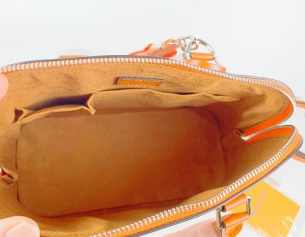 Replica Louis Vuitton Epi Leather Alma PM Handbag In Orange With Jacquard Strap - Image 5