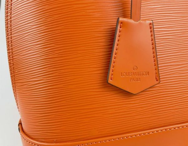 Replica Louis Vuitton Epi Leather Alma PM Handbag In Orange With Jacquard Strap - Image 8