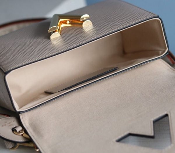 Replica Louis Vuitton Epi Leather Twist MM Handbag In Galet Gray With Embroidered Strap - Image 9