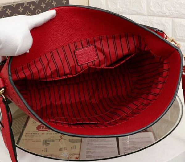 Replica Louis Vuitton Monogram Empreinte Melie Hobo In Red - Image 6
