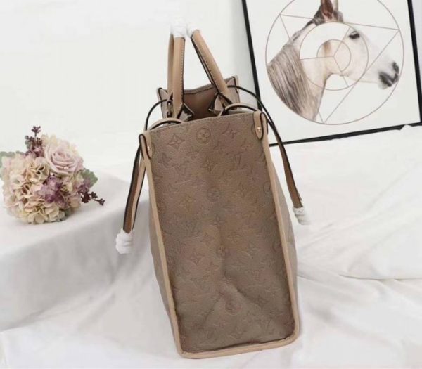 Replica Louis Vuitton Monogram Empreinte Giant Onthego GM Tote In Beige - Image 3