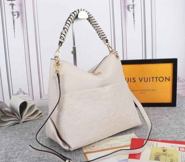 Replica Louis Vuitton Monogram Empreinte Leather Maida Hobo In Cream - Image 2
