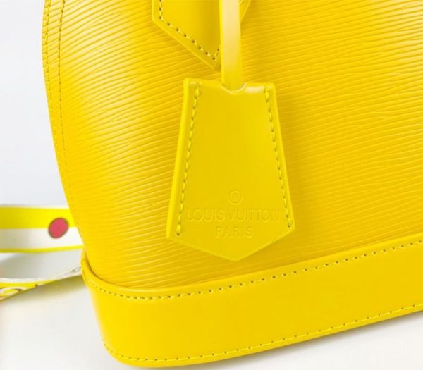 Replica Louis Vuitton Epi Leather Alma BB Handbag In Cedrat Yellow With Jacquard Strap - Image 9