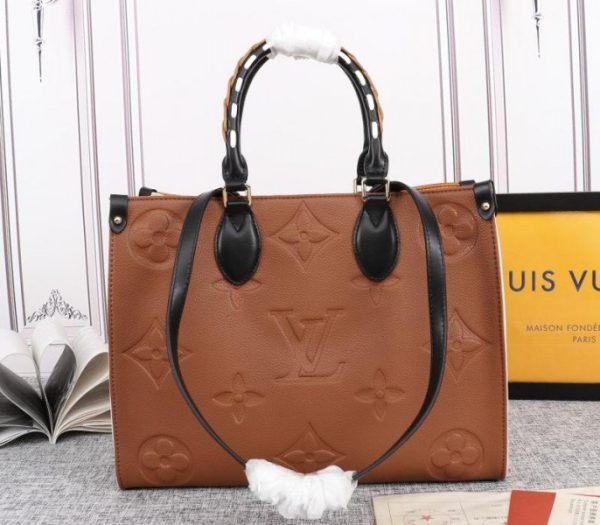 Replica Louis Vuitton Monogram Empreinte Wild At Heart Onthego MM Tote In Caramel Brown