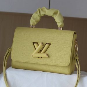 Replica Louis Vuitton Taurillon Leather Twist MM Scrunchie Handle In Ginger Yellow