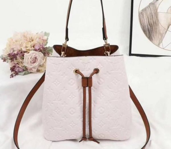 Replica Louis Vuitton Monogram Empreinte NeoNoe MM Bag In Cream