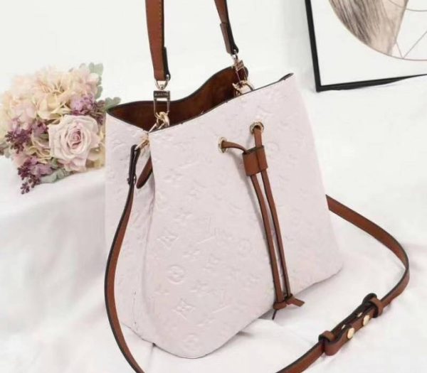 Replica Louis Vuitton Monogram Empreinte NeoNoe MM Bag In Cream - Image 2