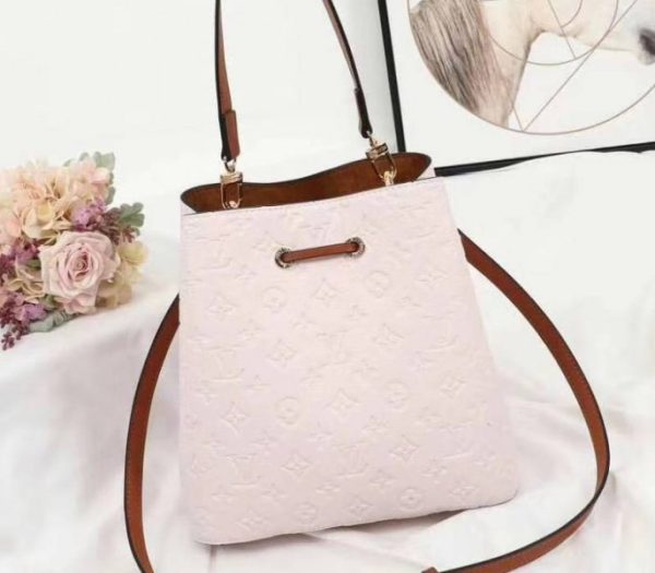 Replica Louis Vuitton Monogram Empreinte NeoNoe MM Bag In Cream - Image 3