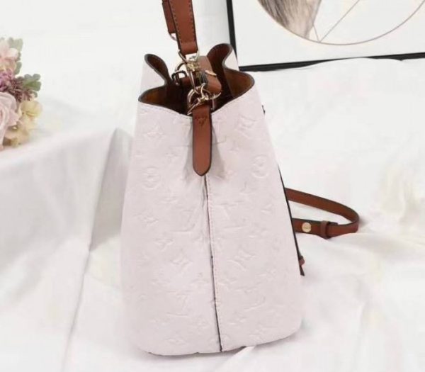 Replica Louis Vuitton Monogram Empreinte NeoNoe MM Bag In Cream - Image 4