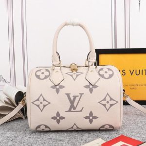 Replica Louis Vuitton Bicolor Monogram Empreinte Leather Speedy Bandouliere 25 Handbag In Cream And Bois De Rose Pink