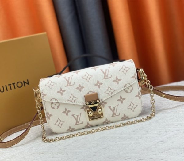 Replica Louis Vuitton Monogram Dune Canvas Metis East West Pochette