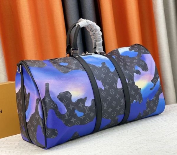 Replica Louis Vuitton Monogram Eclipse Keepall 55 Bandouliere Travel Bag In Blue Sunrise - Image 2