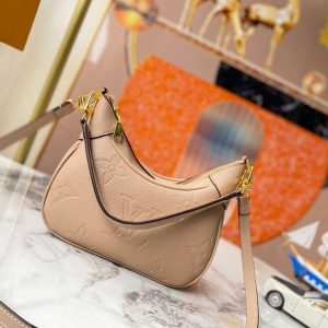 Replica Louis Vuitton Monogram Empreinte Leather Bagatelle Mini Hobo In Beige