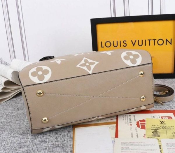 Replica Louis Vuitton Monogram Empreinte Montaigne MM In Tourterelle Gray - Image 4