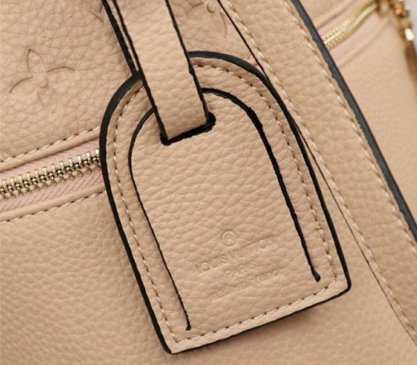 Replica Louis Vuitton Monogram Empreinte Melie Hobo In Beige - Image 9