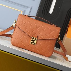 Replica Louis Vuitton Monogram Empreinte Metis Handbag In Cognac Brown