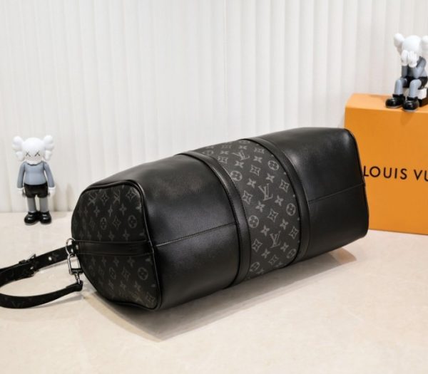 Replica Louis Vuitton Taiga Leather Keepall Bandouliere 50 Travel Bag In Black - Image 4