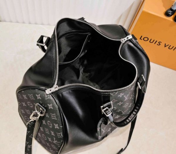 Replica Louis Vuitton Taiga Leather Keepall Bandouliere 50 Travel Bag In Black - Image 5