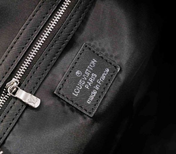 Replica Louis Vuitton Taiga Leather Keepall Bandouliere 50 Travel Bag In Black - Image 6