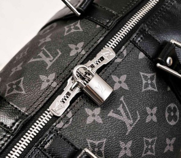 Replica Louis Vuitton Taiga Leather Keepall Bandouliere 50 Travel Bag In Black - Image 7