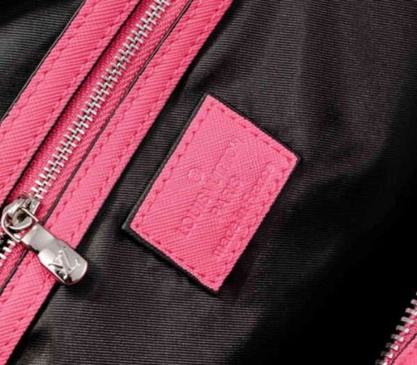 Replica Louis Vuitton Taiga Leather Keepall Bandouliere 50 Travel Bag In Pink - Image 6