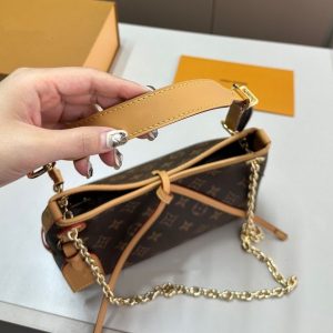 Replica Louis Vuitton Monogram CarryAll BB Handbag
